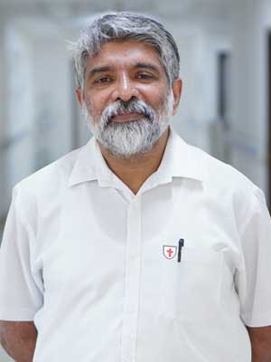 Dr. Shaji P Koshy